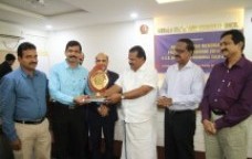 Sri. Ravikumar, General Manager and his team of Wonderla Holidays Ltd., Kochi receiving Best Productivity Performance award in the Service Organization category